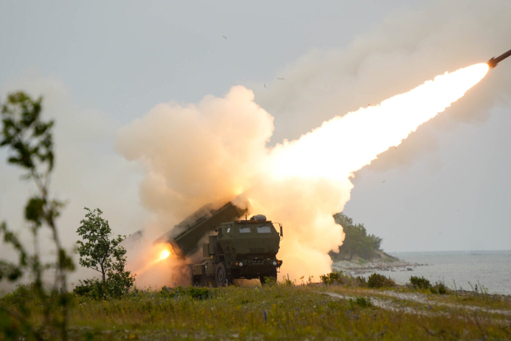 An Estonian Defense Forces M142 High Mobility Artillery Rocket System (HIMARS) fires a training rocket during a live-fire exercise in Undva, Estonia, July 11, 2025. The exercise included dry-firing, equipment staging, communication systems checks, and concluded with live-fire qualifications. In 2022, the U.S. State Department approved HIMARS sales to Estonia, Latvia, and Lithuania after the invasion of Ukraine. Estonia became the first of the three Baltic nations to receive and deploy HIMARS. V Corps uses a reliable and interconnected sustainment network to support its mission, enable NATO warfighting capacity and modernize its force. (U.S. Army photo by Staff Sgt. Rose Di Trolio).